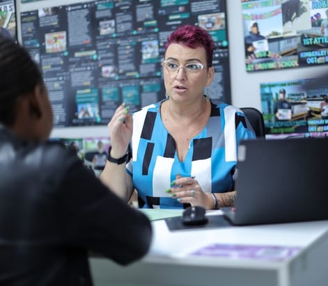 Mrs Jordeen Kotze explaining the process to a new student at Kimberley Driving School